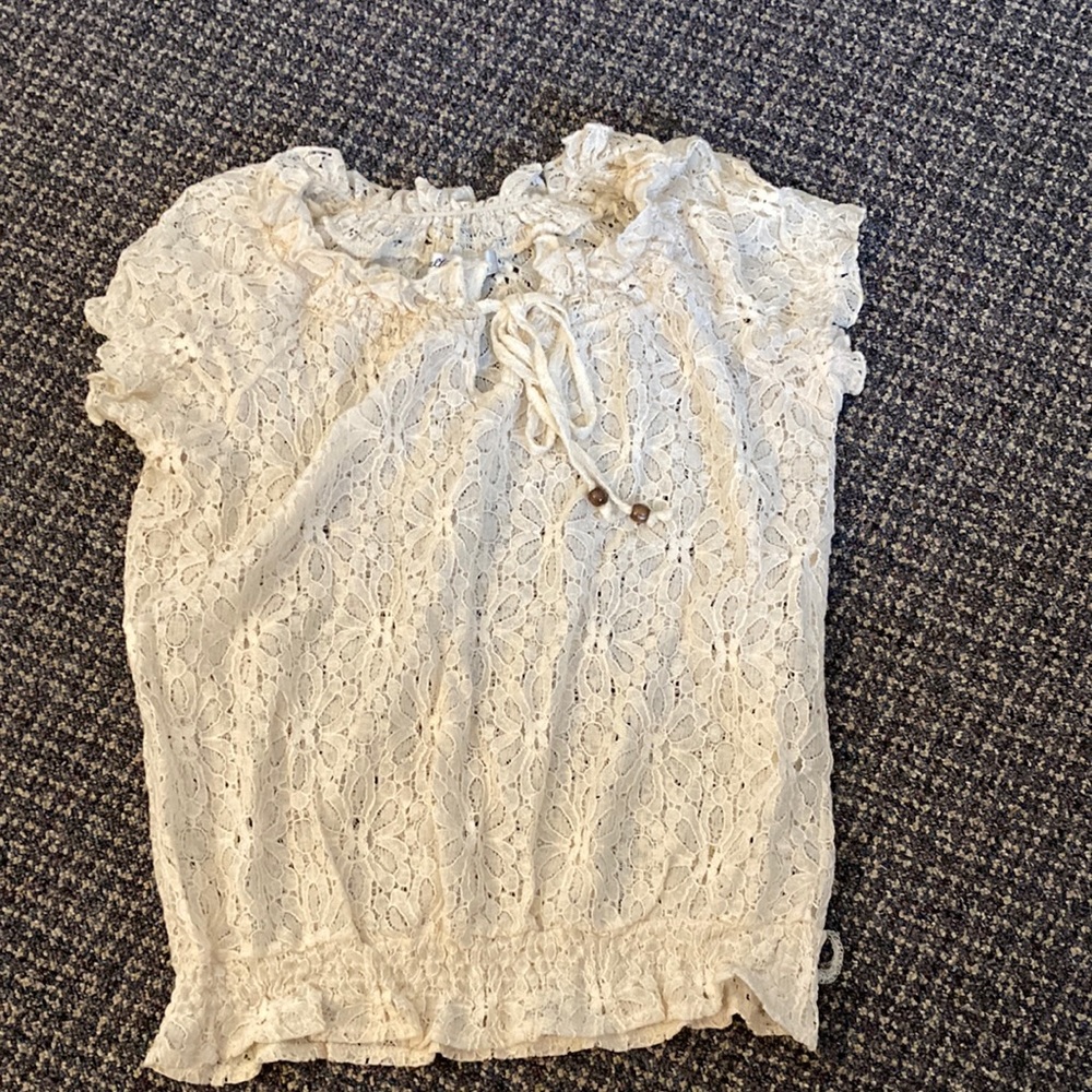 Off-white cream colored top.